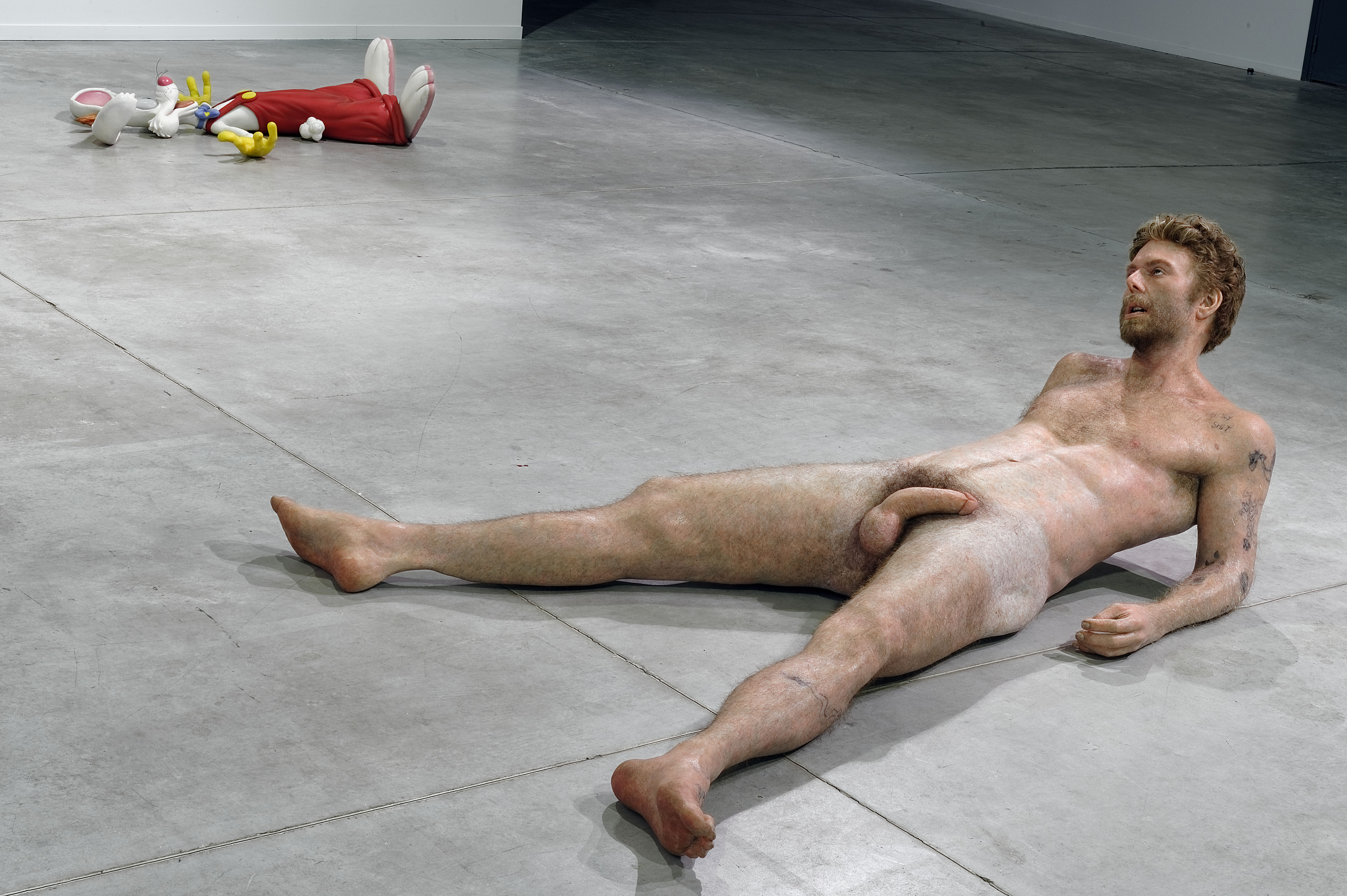 Naked man lying down